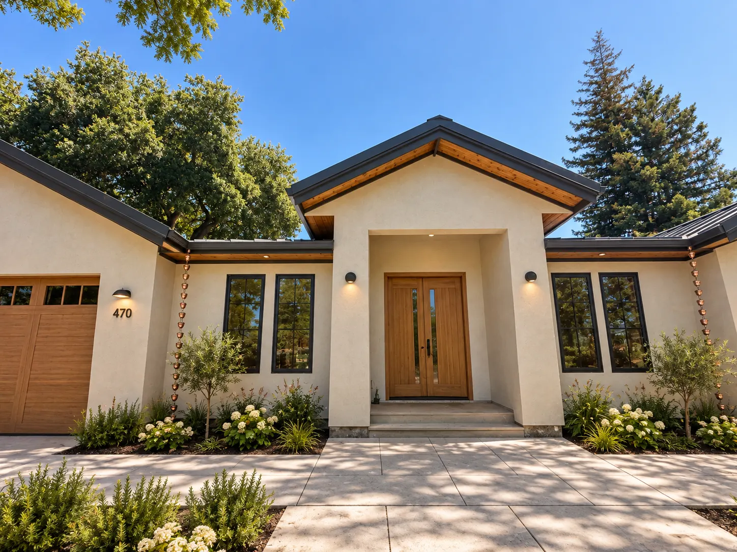 Click to view full screen Street-facing elevation with oak entry doors and copper rain chains