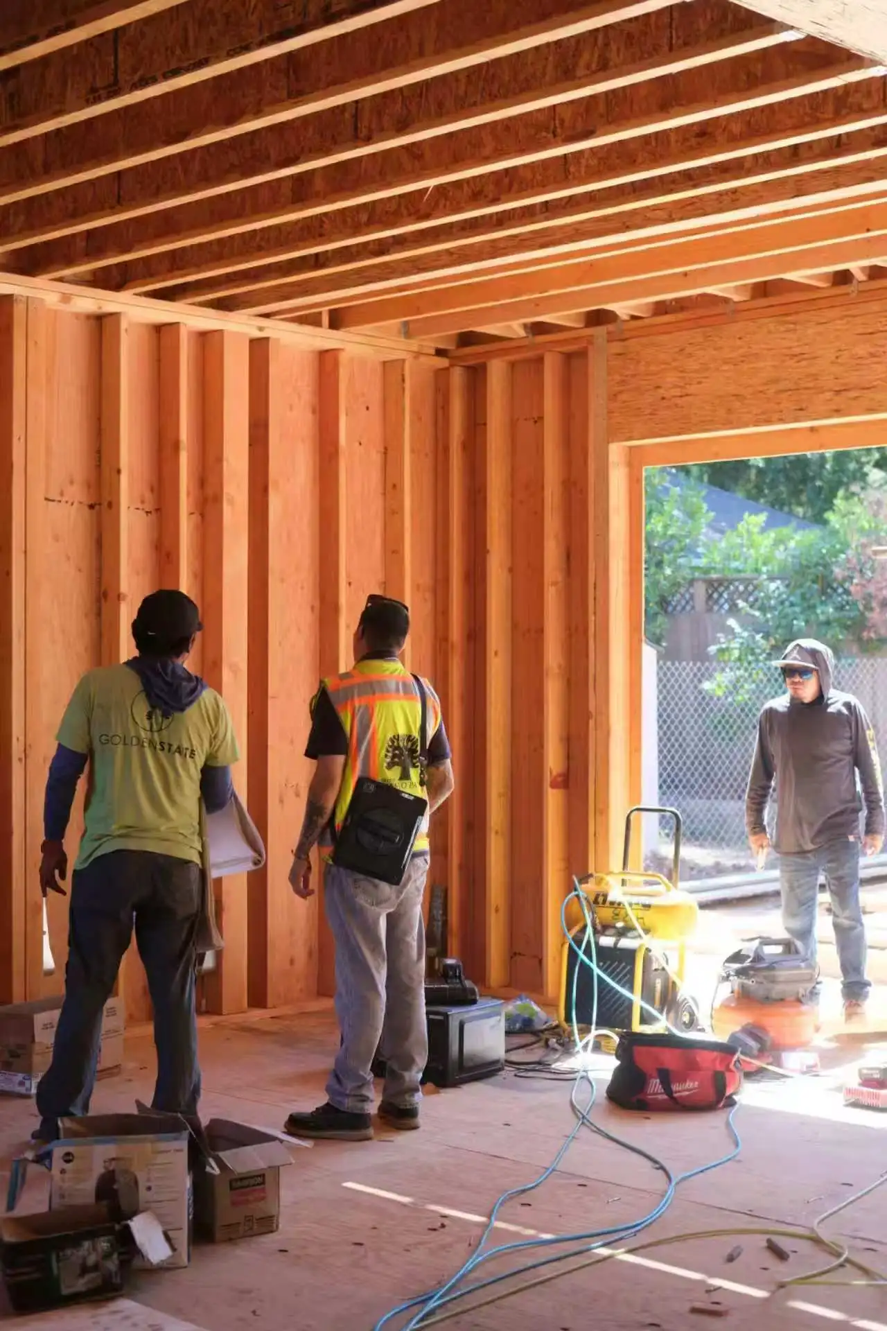 Click to view full screen Walking the site during construction